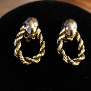 Gold and black clip on earrings